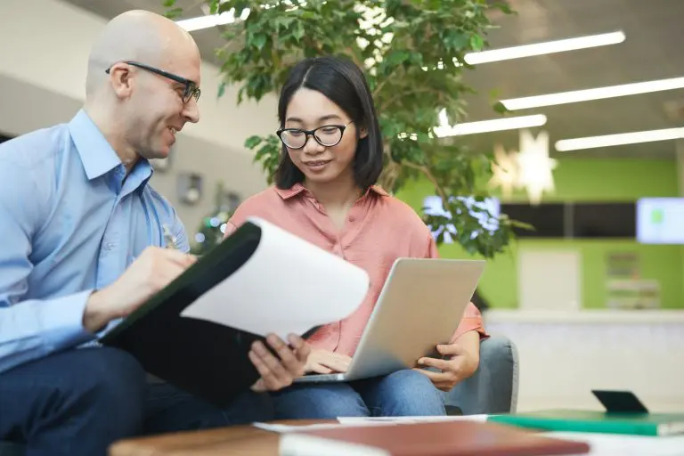 Asian Woman Talking to Internship Manager