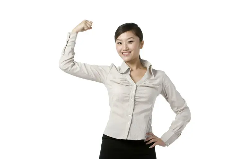 Businesswoman showing strength